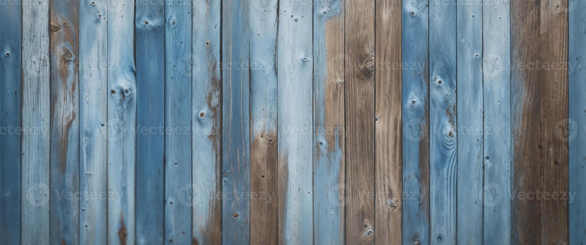 A blue painted wood wall with a brown and blue color photo