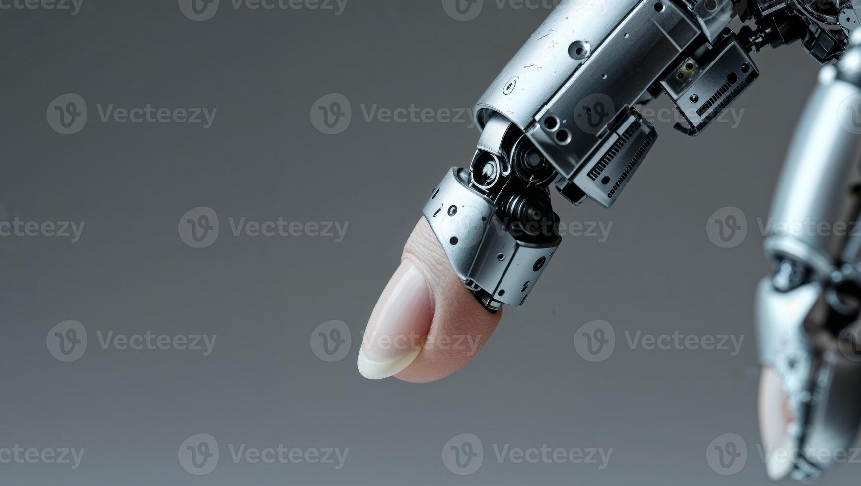 A robotic hand with a finger on it photo