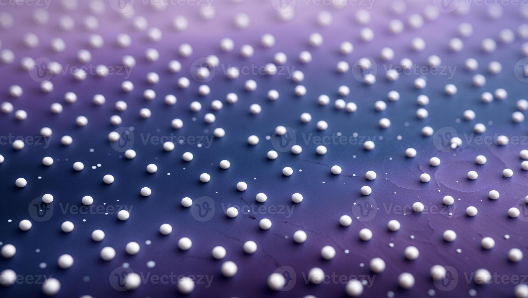 A close up of a purple and blue background with white dots photo