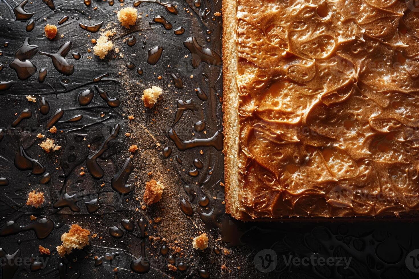 Caramel Cake Slice with Crumbs and Drizzle photo