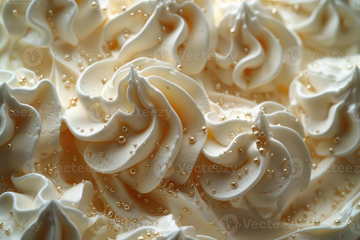 Creamy swirls of frosting adorned with golden beads photo