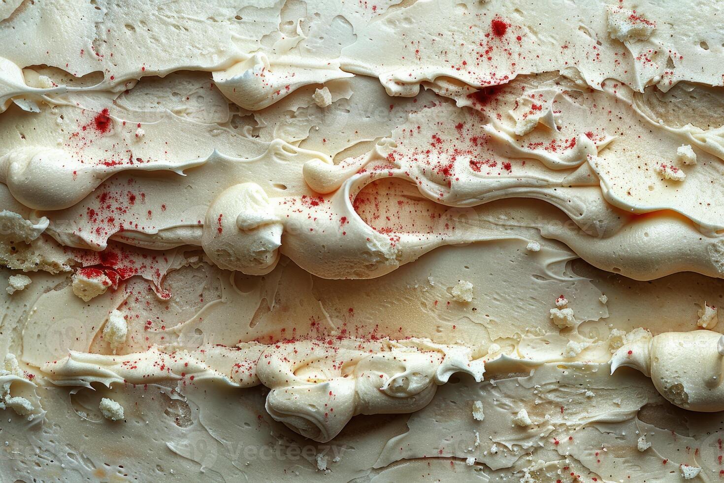 Creamy Frosting Swirls with Red Sprinkles and Crumbles photo