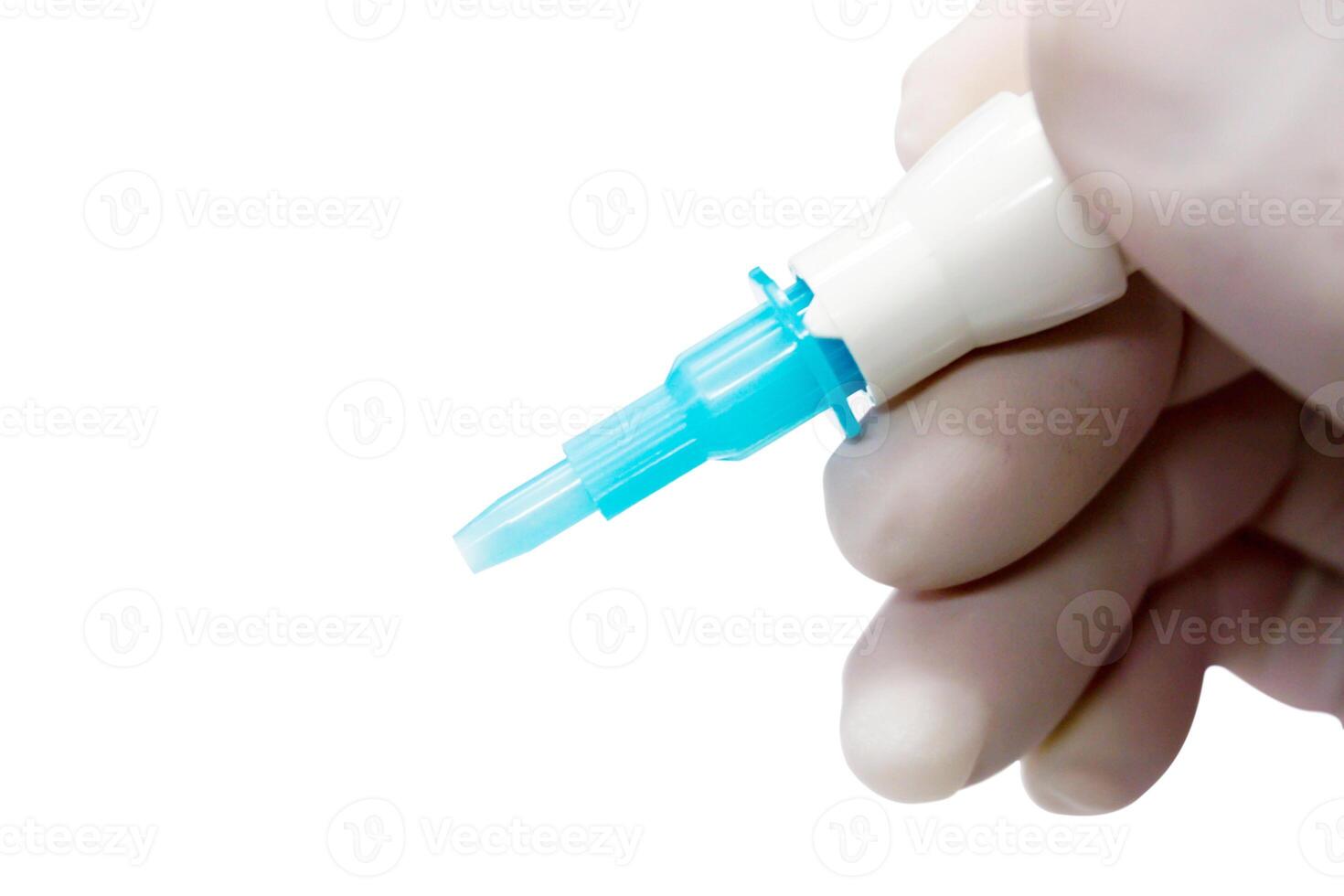 Closeup and crop hand of doctor in white medical glove holding needle pen for stab and glucose check in the blood isolate on white background and make with paths. photo