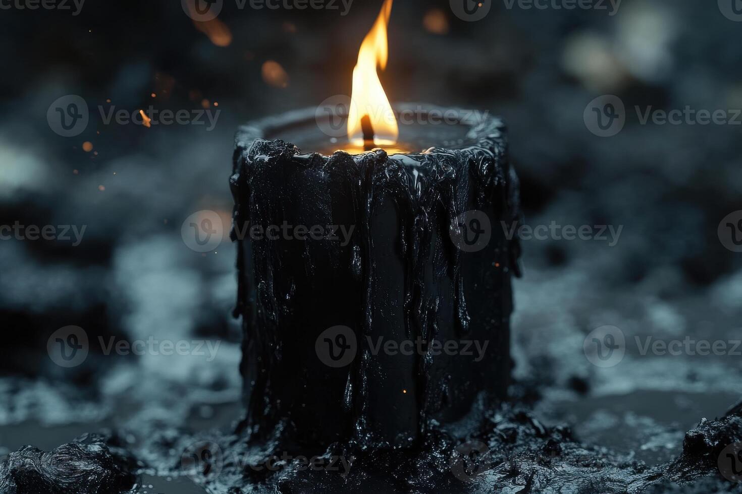 Black Candle with Melting Wax Creating a Dark Atmosphere for Relaxation and Ambiance photo