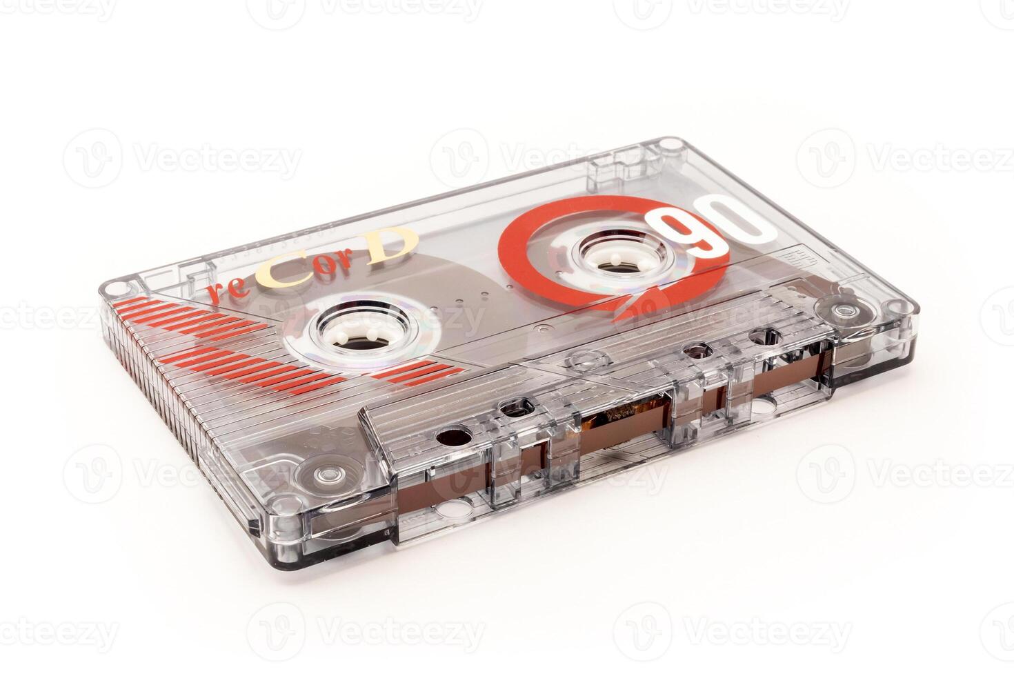 Audio cassette tape - old vintage compact audio cassette on its side isolated on white, bottom view photo