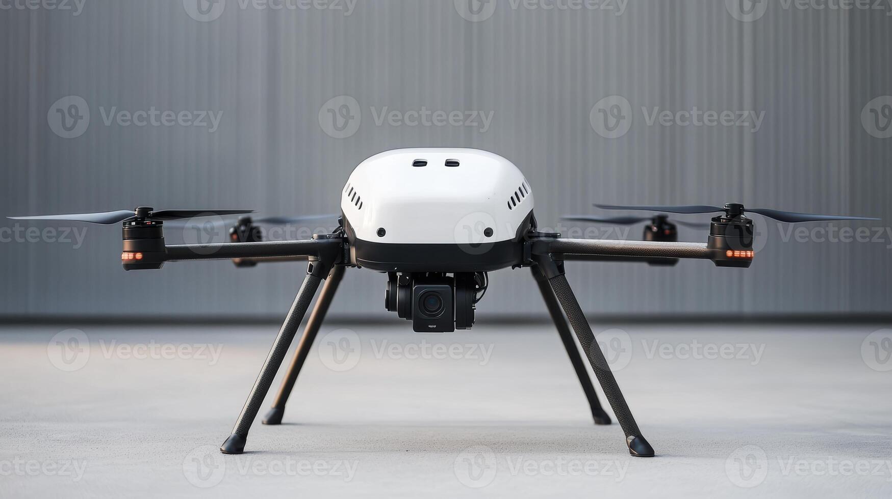 A state-of-the-art drone rests on a smooth surface, showcasing its modern design photo