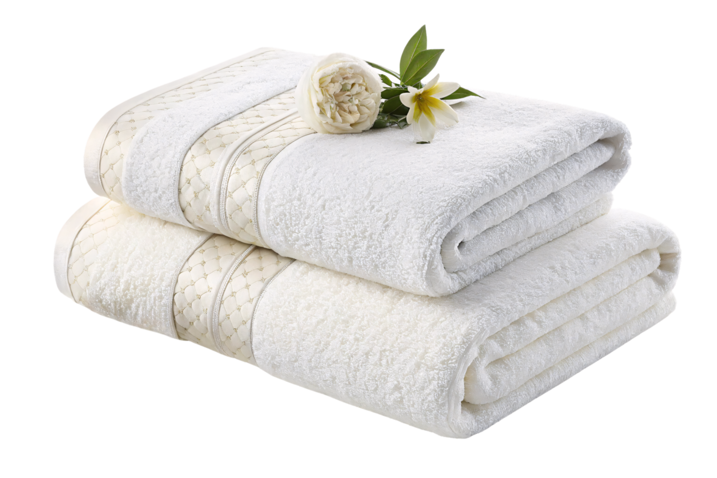Two cream towels folded neatly, adorned with quilted decorative bands and topped with white flowers, embodying elegance and luxury png