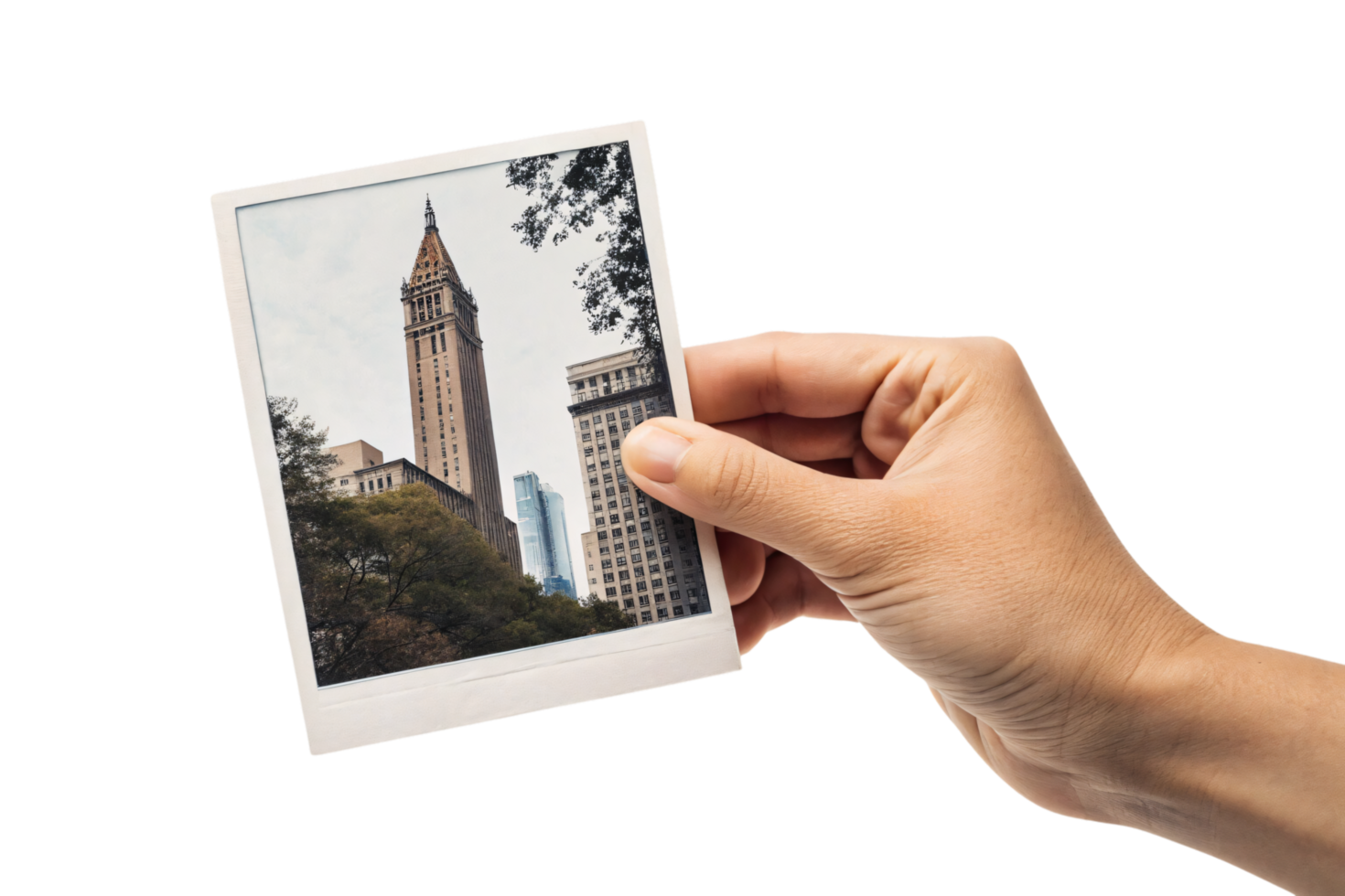 A hand displays a slide showcasing an urban scene, featuring a historic clock tower surrounded by modern skyscrapers and lush green trees under a cloudy sky png