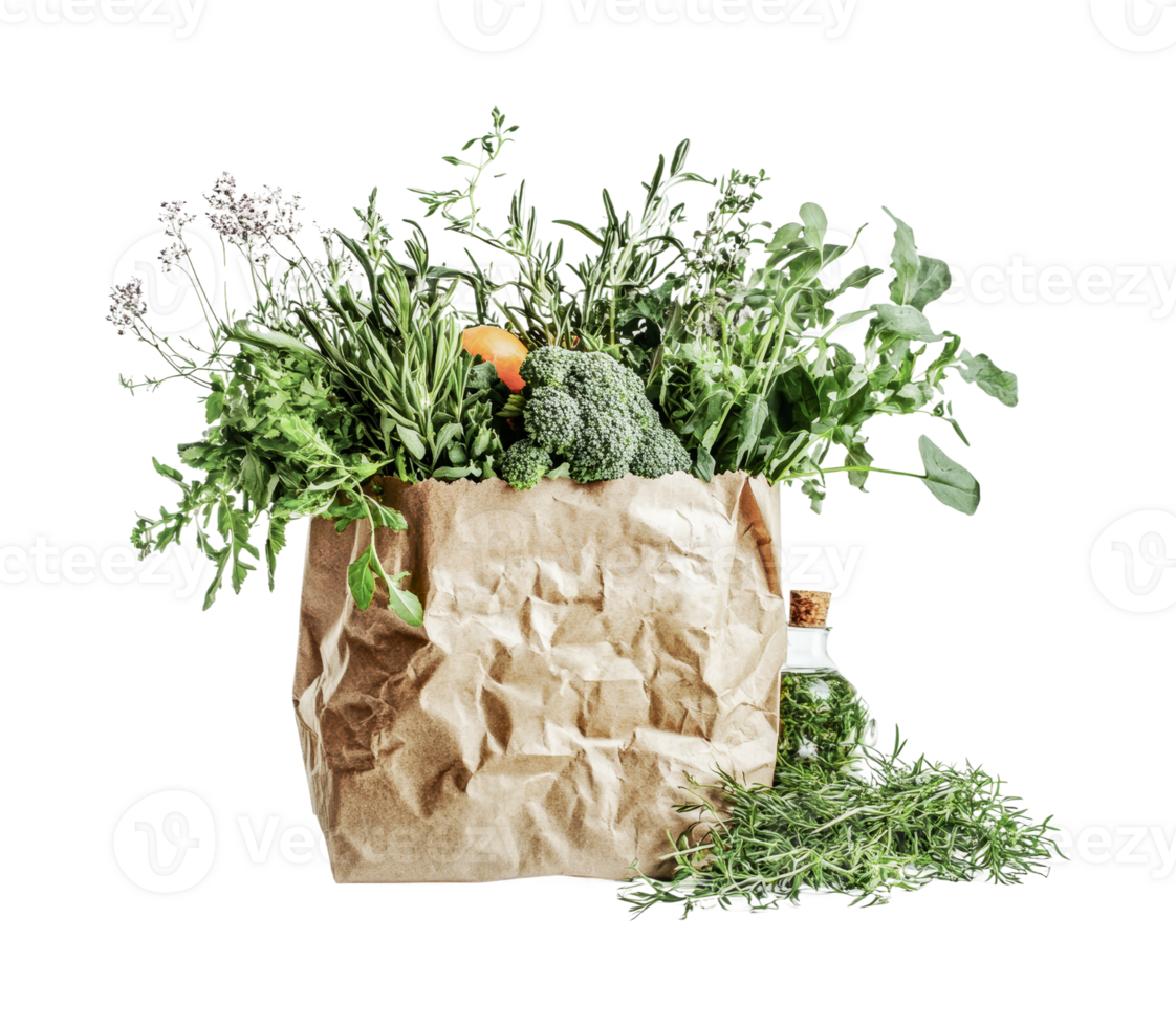 Fresh organic vegetables in a brown paper bag with herbs and spices, cut out png