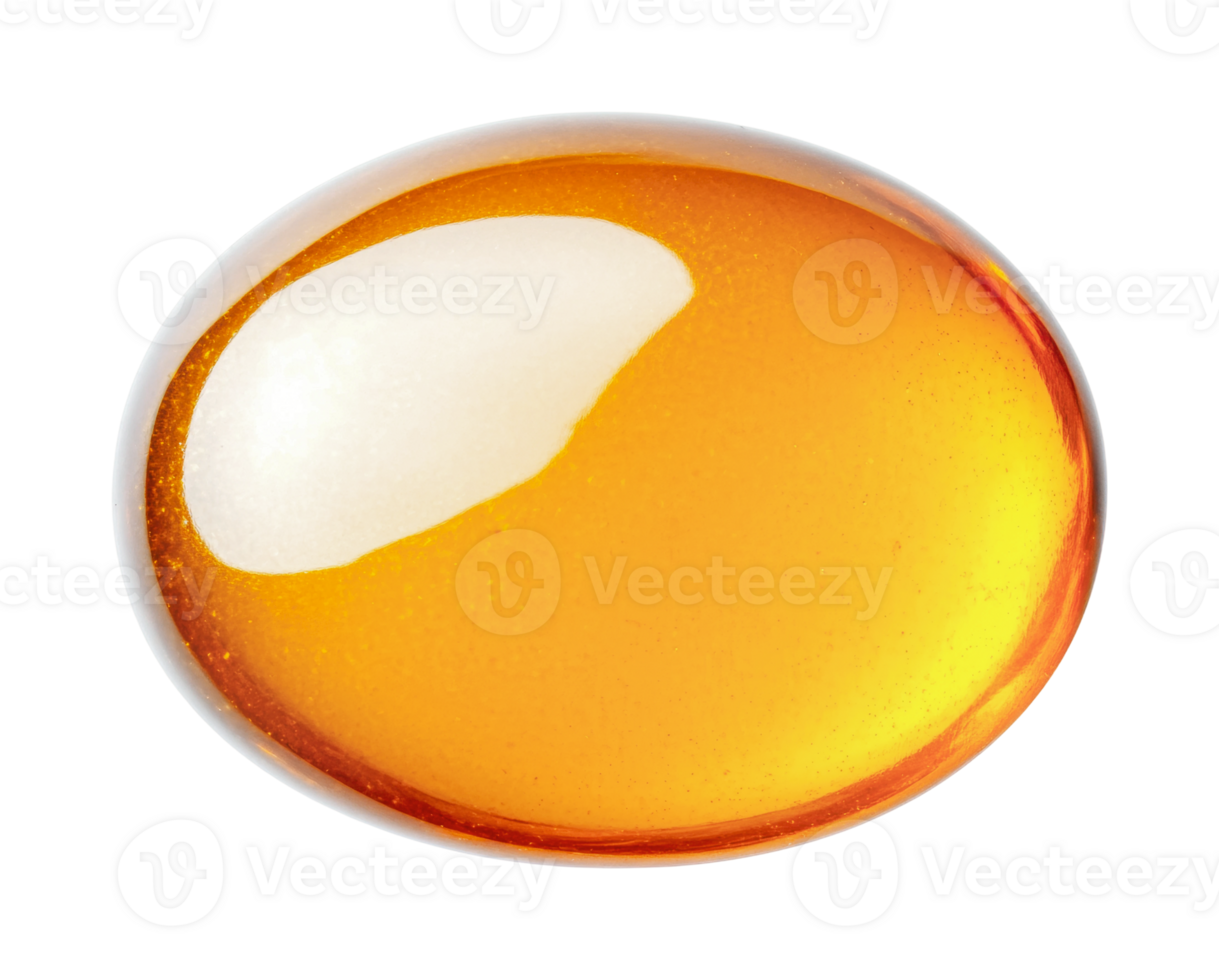Transparent amber gel capsule with light reflection on black background png