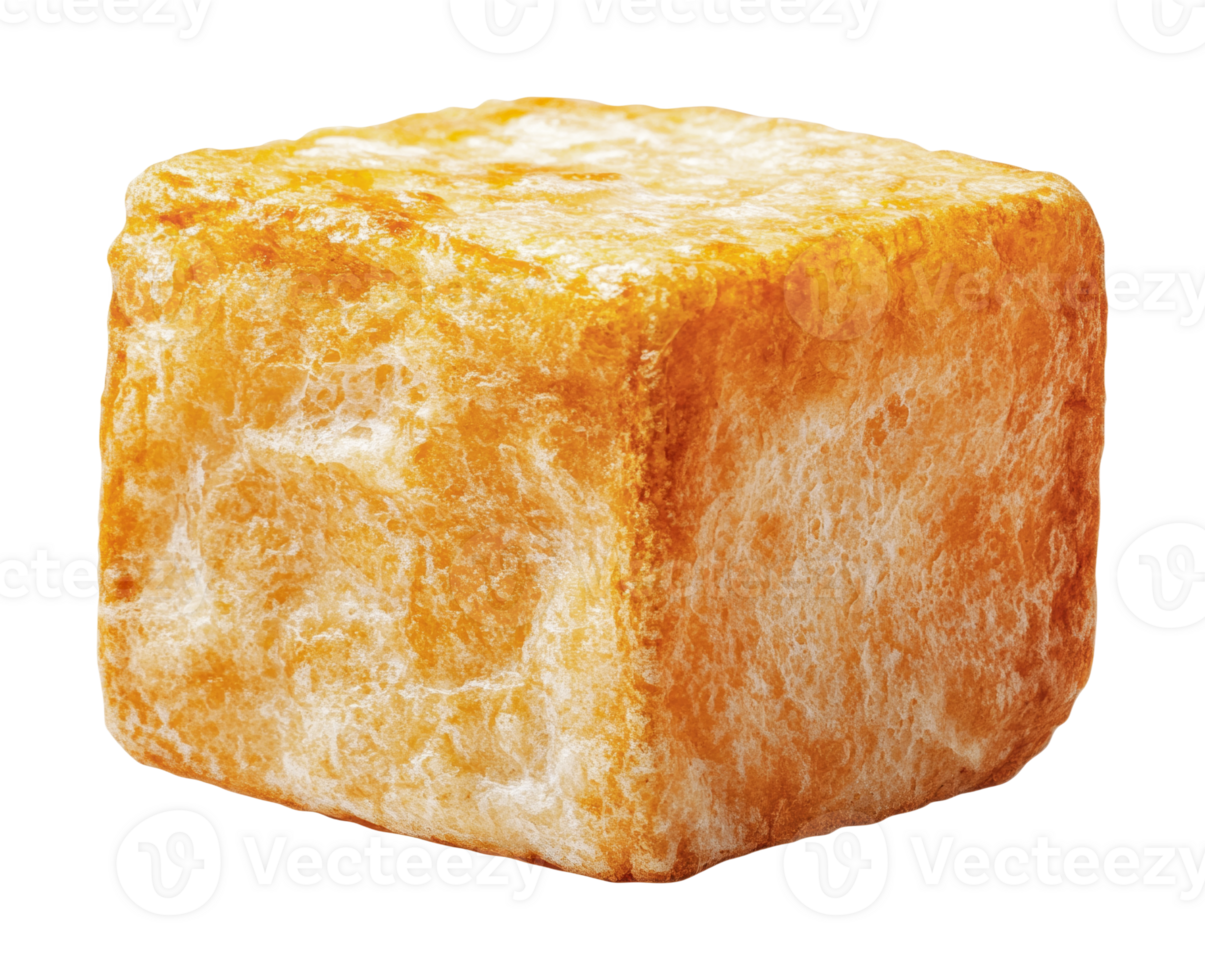 Close-up of a golden orange crouton cube isolated on black background png