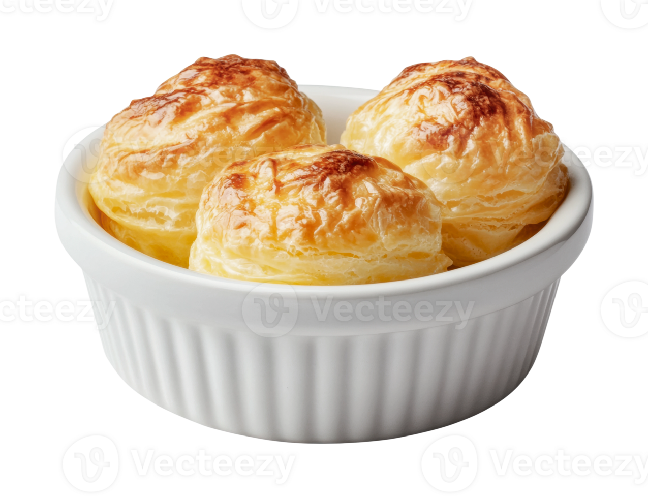 Golden brown puff pastry balls in white ceramic ramekin bowl png