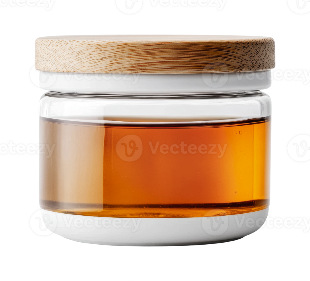 Glass jar with wooden lid containing amber liquid png