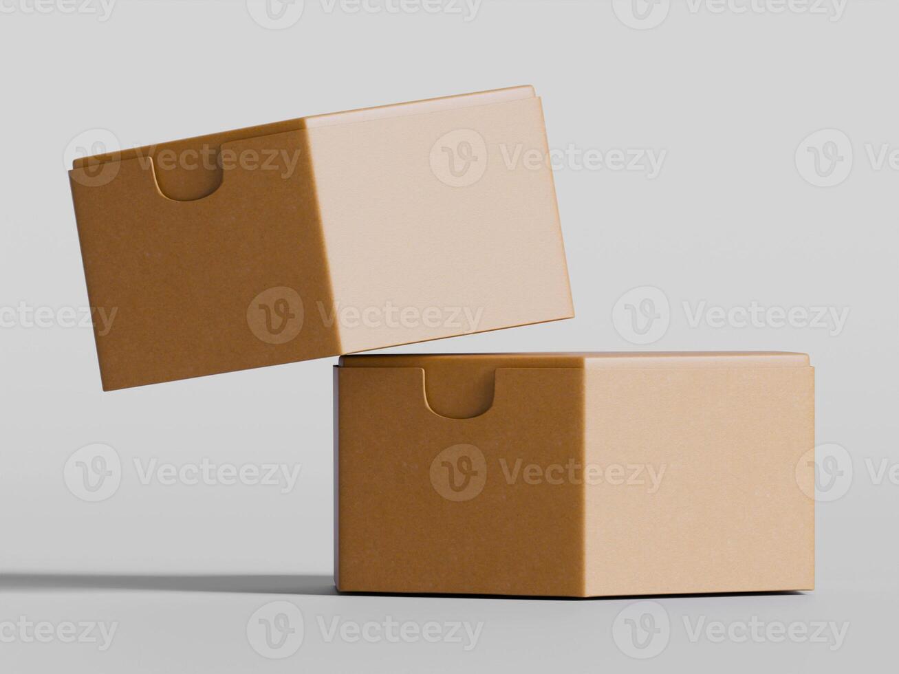 two rectangular cardboard boxes stacked one slightly tilted simple brown photo