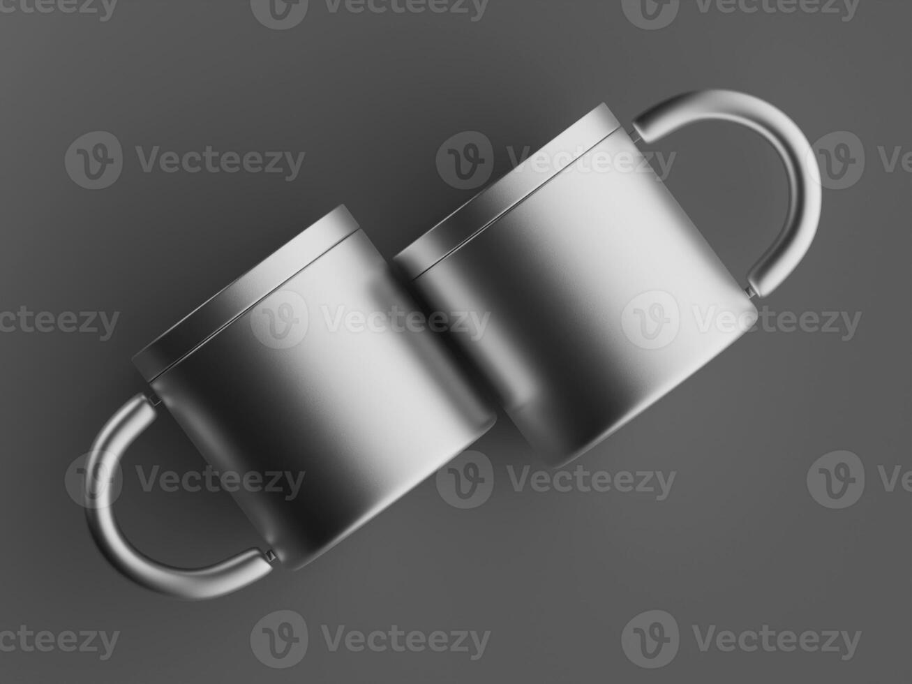 two metallic mugs touching at handles floating against grey background dramatic shadows photo