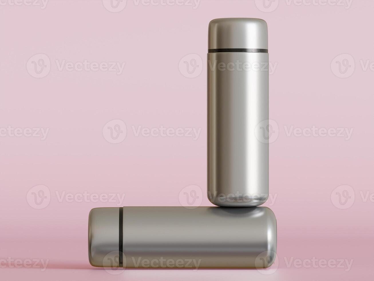 silver mini water bottle balanced on horizontal bottle pink background soft shadows photo