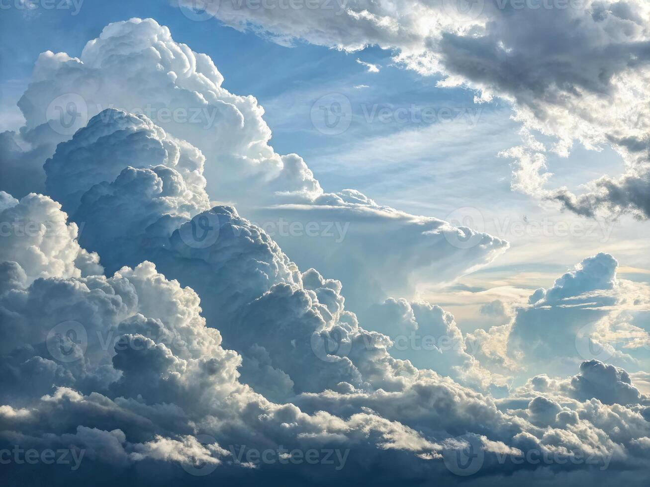 A stunning display of cumulus clouds fill the sky, creating a heavenly and peaceful vista. photo