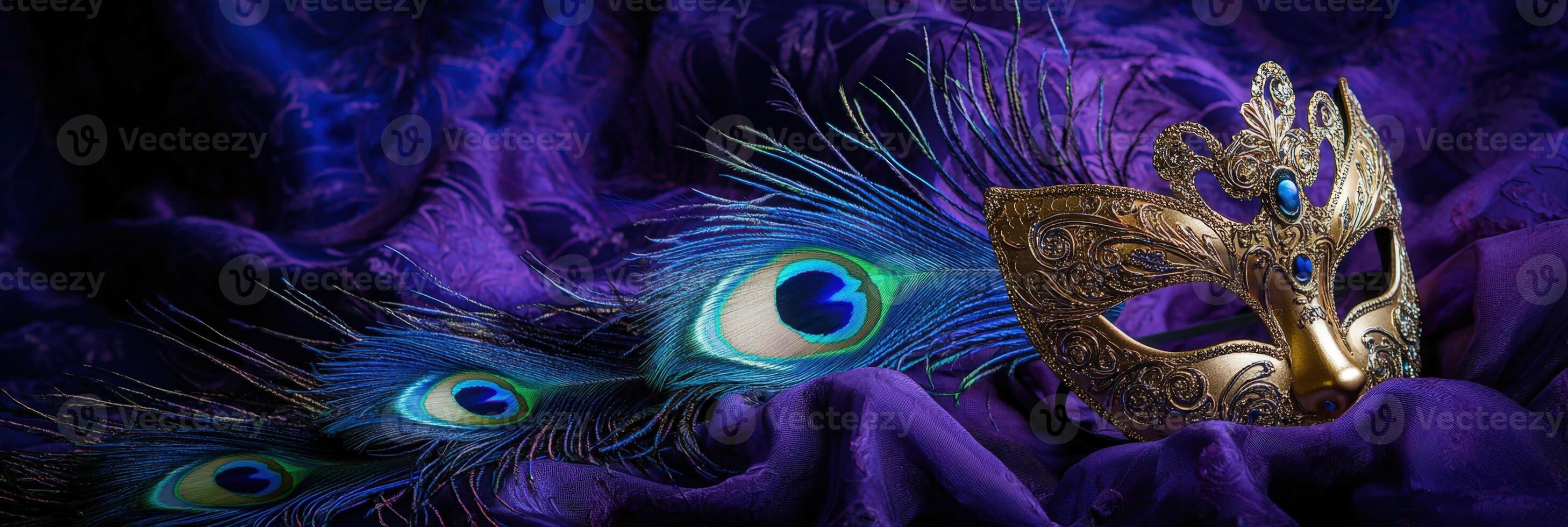 A masquerade mask and peacock feathers on a purple cloth photo