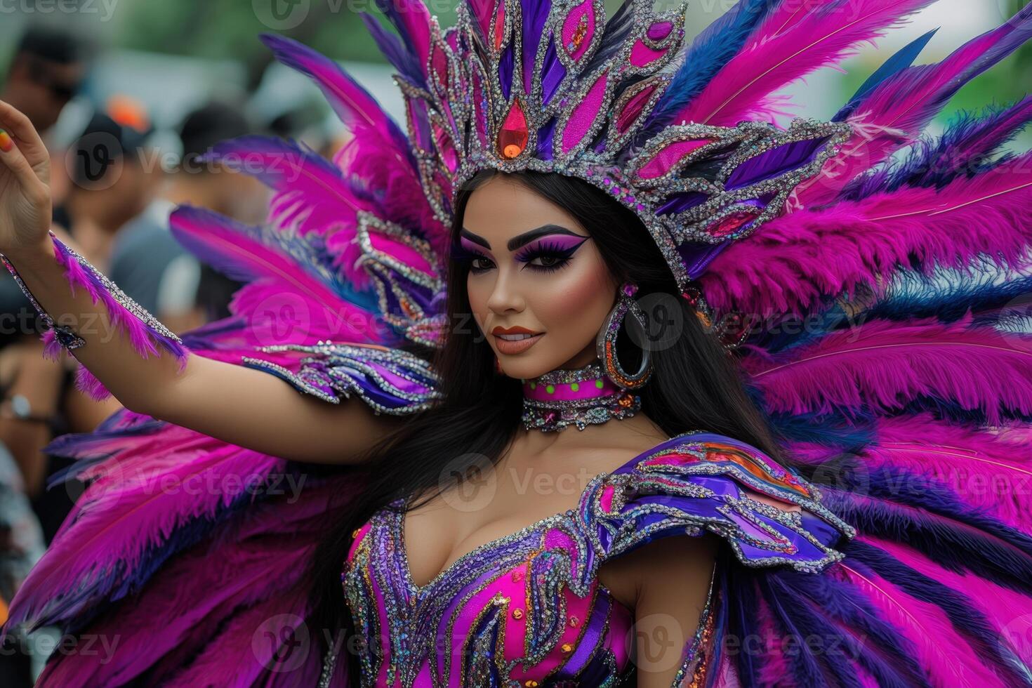 A woman in a colorful costume with feathers photo