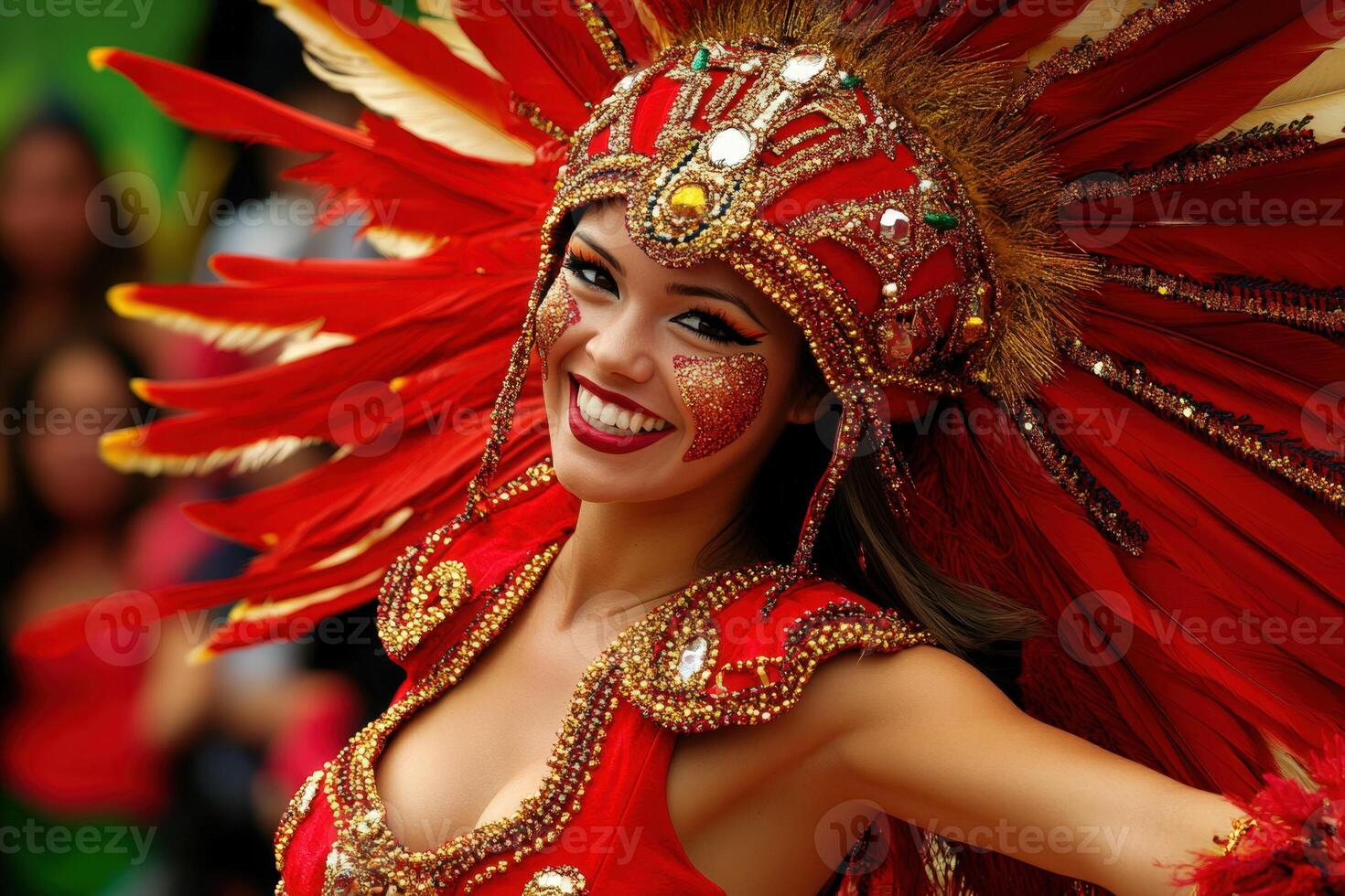 A woman in a red costume with feathers and gold headdress photo
