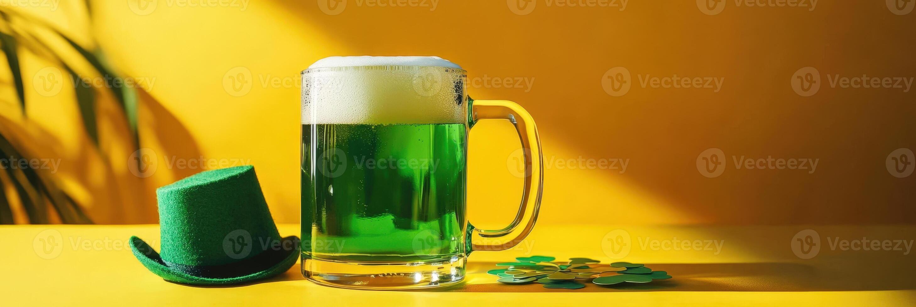 St patrick's day beer mug and hat on yellow background photo