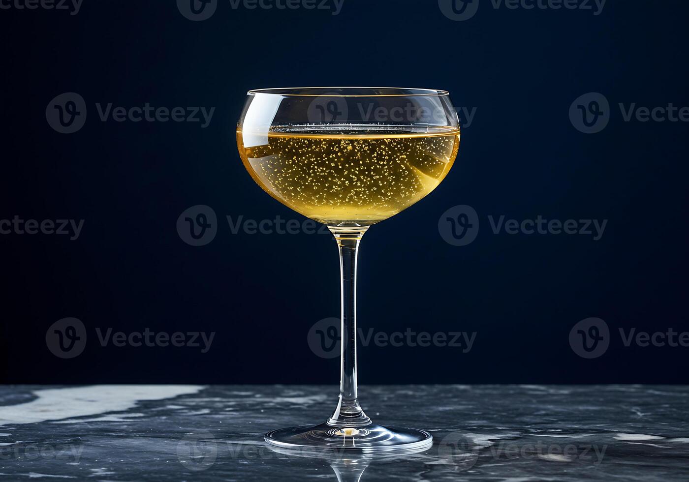 Golden Sparkling Wine on Dark Marble photo