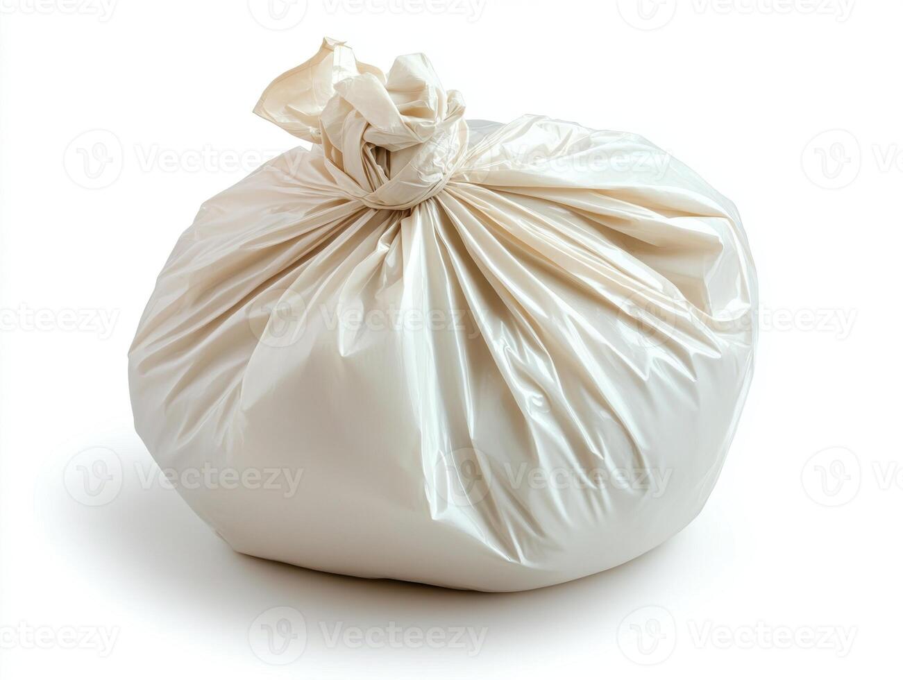 Trash bag tied tightly for secure disposal in a clean environment photo