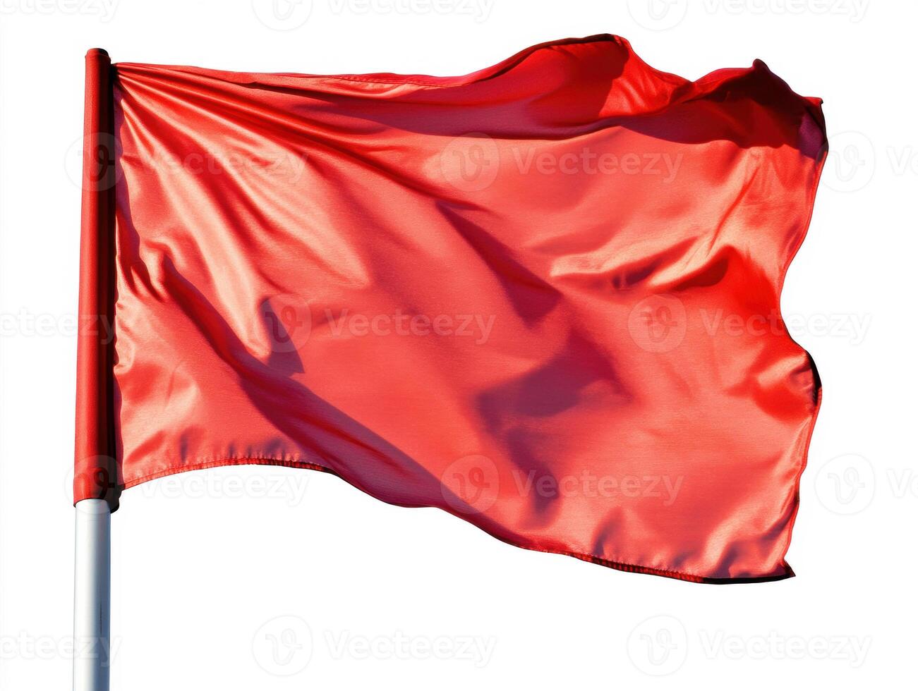 Bright red flag waving in the wind against a clear background photo