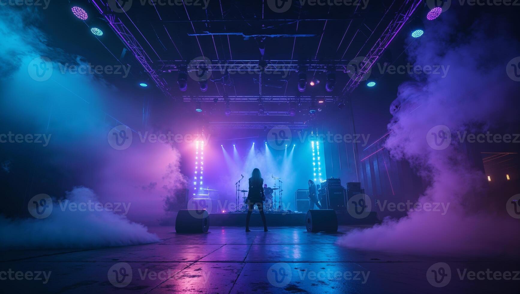 Concert performance with dramatic lighting and fog in an urban venue at night photo