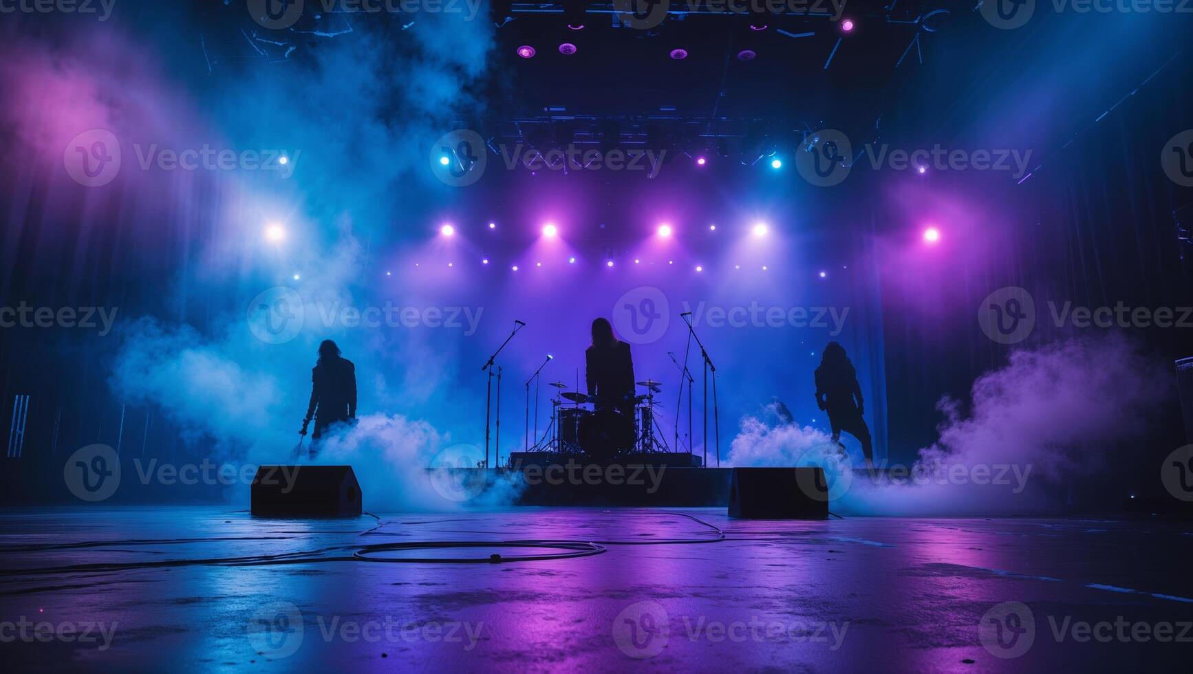 Live music performance with vibrant lighting and fog on stage in an indoor venue photo