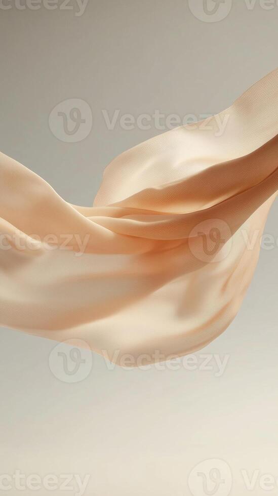 Flowing silk fabric swaying gracefully in soft light with a neutral background photo