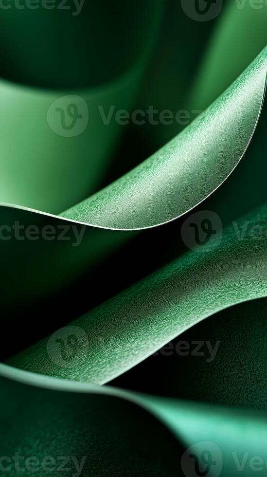 Textured green layers of material create a visually captivating composition showcasing elegance and depth photo