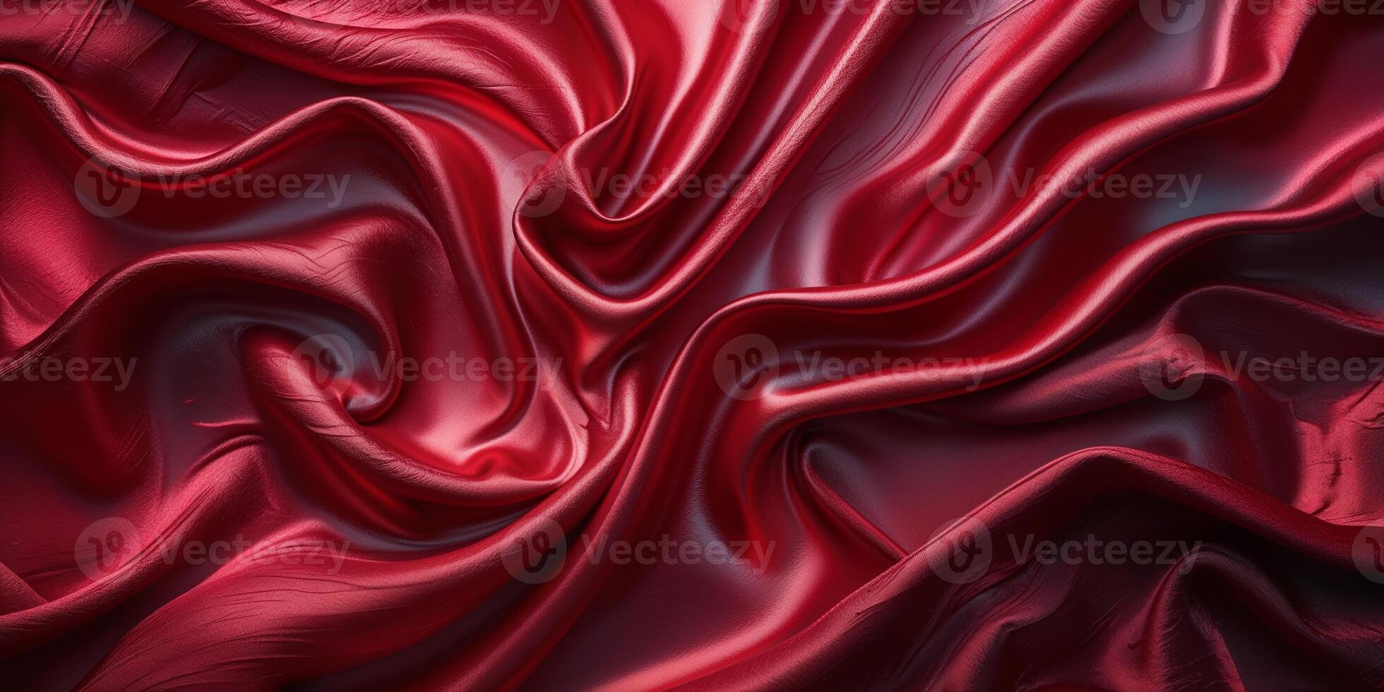 Rich red silk fabric with elegant draping showcasing fine texture and luxurious appearance in natural light photo
