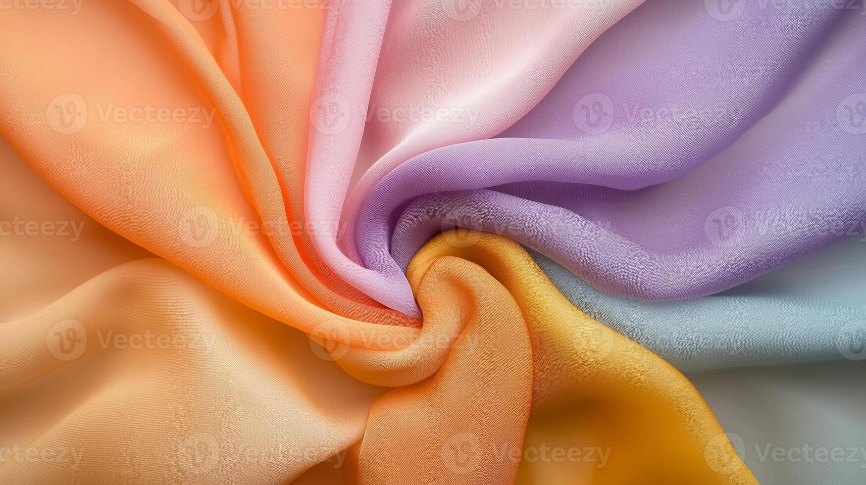 Colorful silk fabric in pastel shades arranged in a circular pattern showcasing smooth textures and vibrant tones photo
