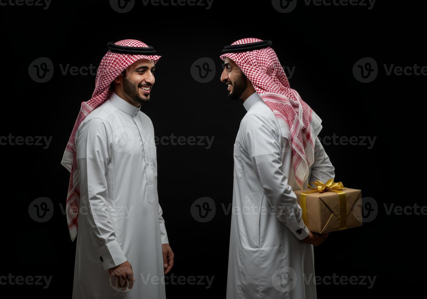 Smiling Arab Men Exchange Gift Black Background photo