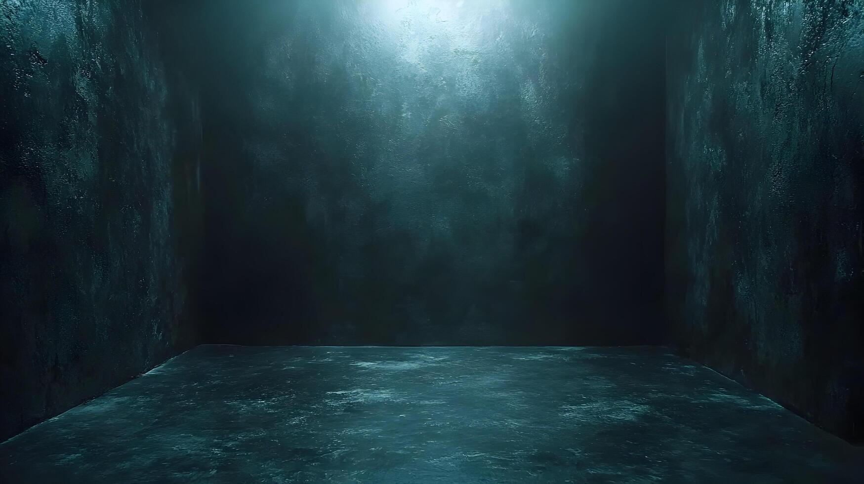 Dark teal room with grunge walls and floor, lit from above. photo