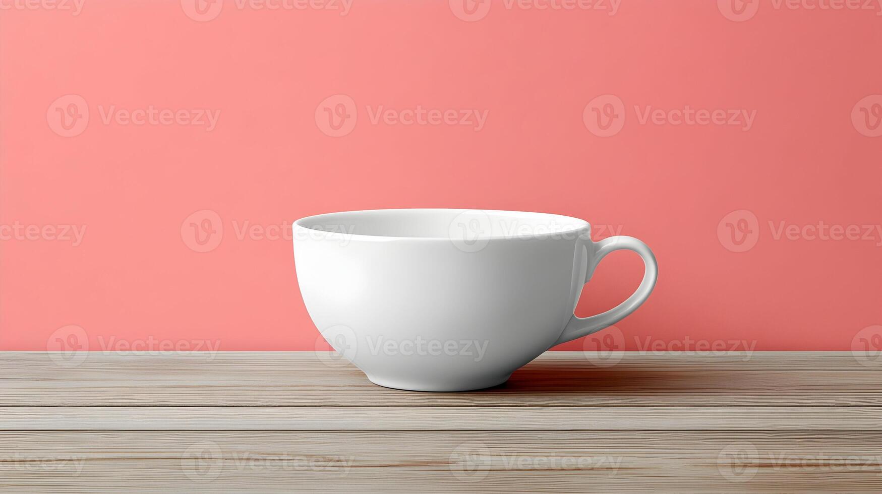 Empty white cup on wooden table against pink wall. photo
