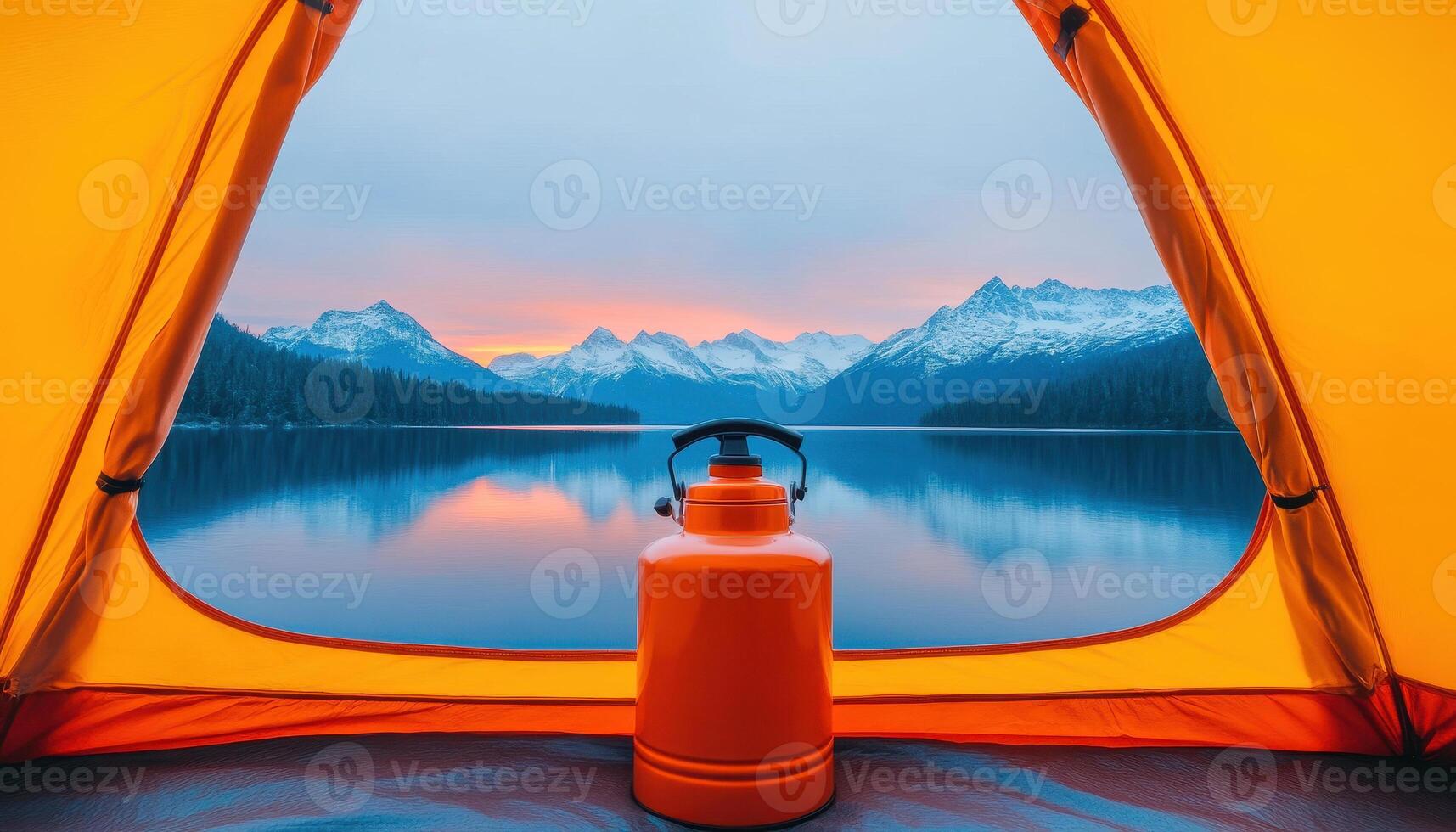 stunning view from tent opening reveals serene lake surrounded by majestic mountains at sunset, with orange kettle in foreground photo