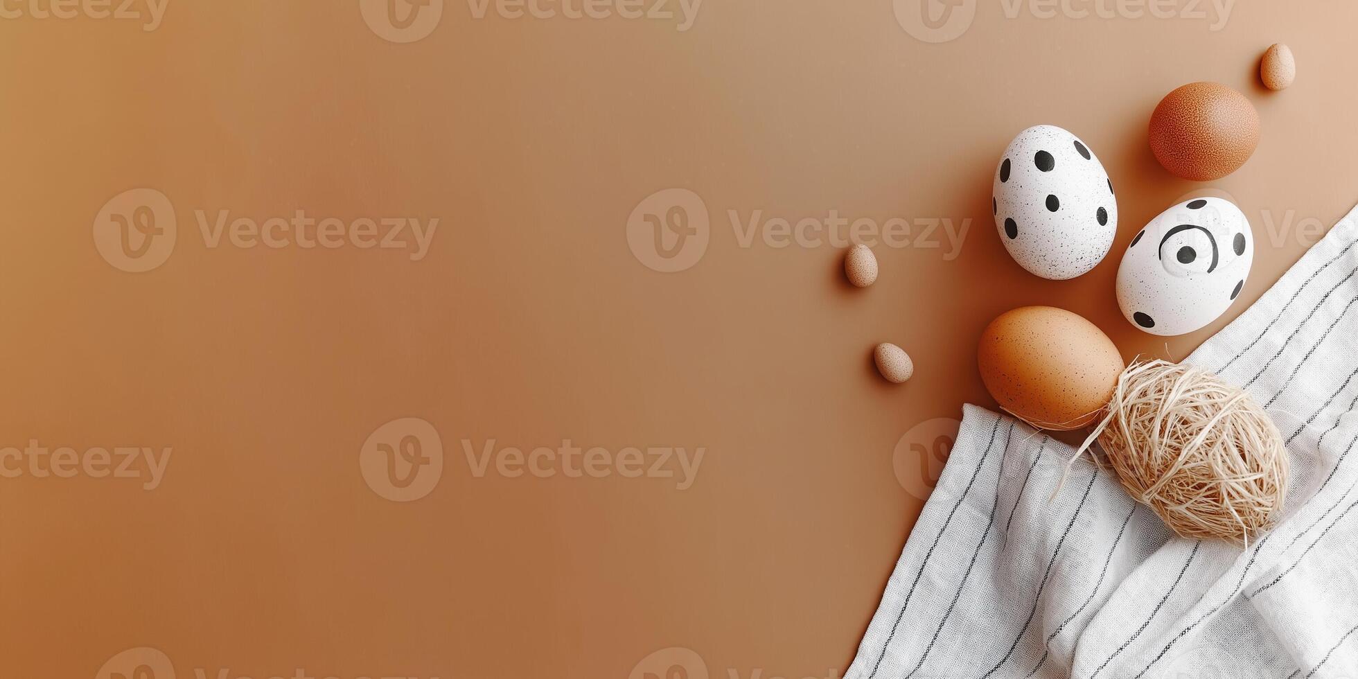 Colorful Easter eggs arranged on a soft olive pastel background with a cloth napkin photo