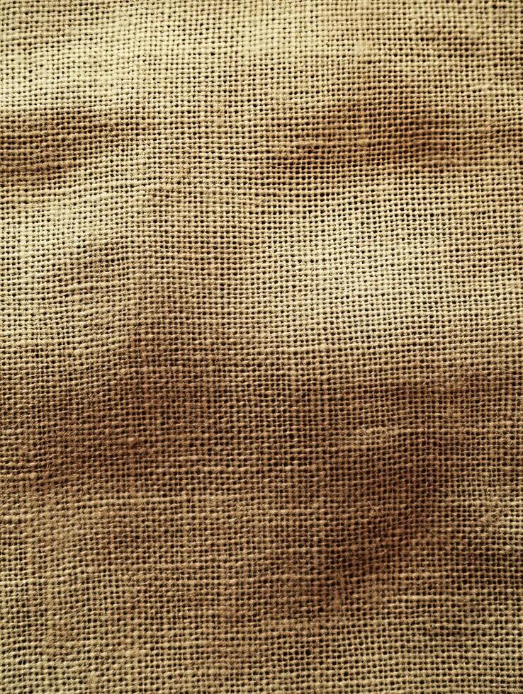 Woven cloth background texture, dark center fading to light edges. Uses include mock-ups photo