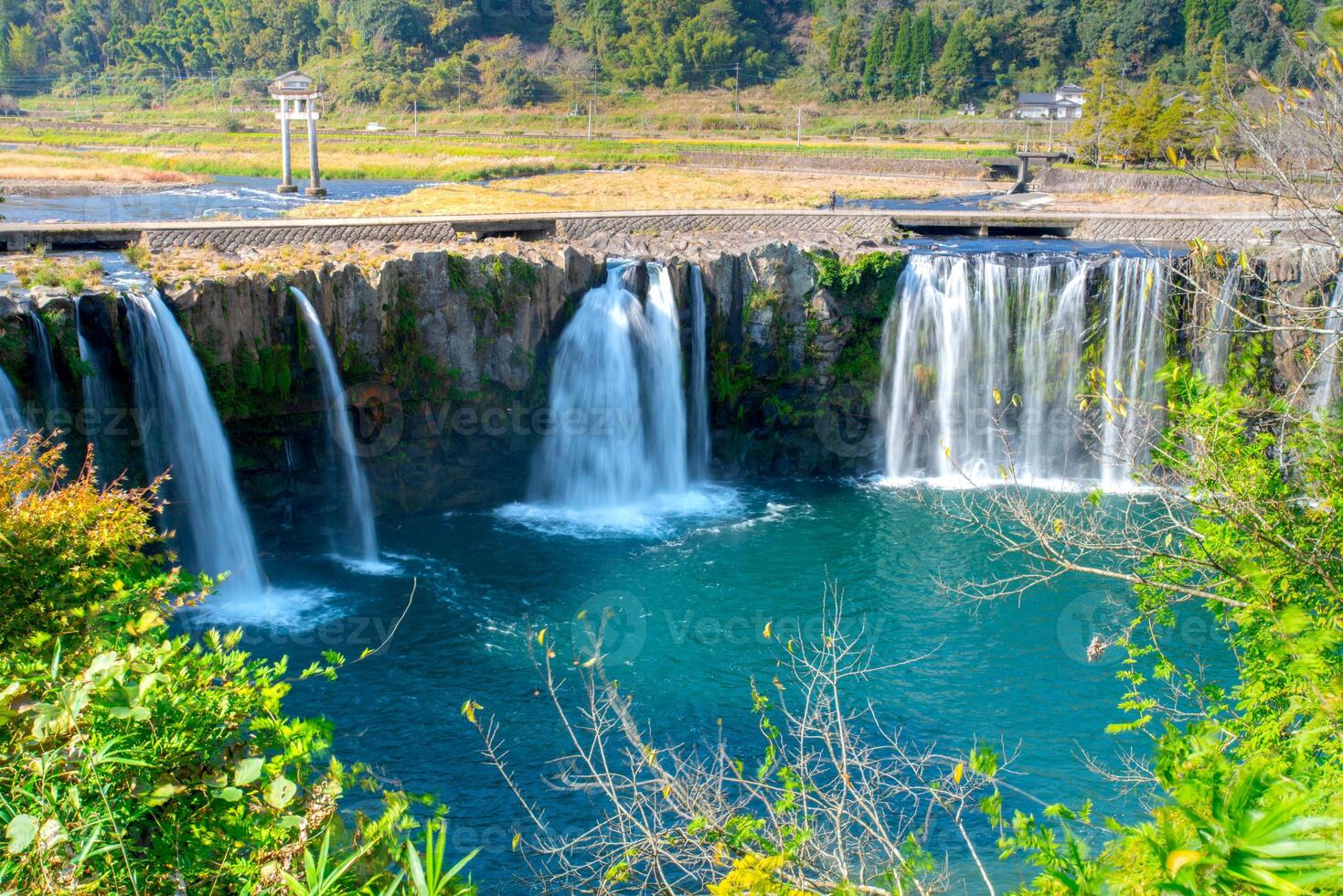 Harajiri falls on Ono River in Ogata Town, referred to as Niagara Falls of East by appearance formed from pyroclastic flows of Mount Aso eruption, Bungo-Ono, Oita, Kyushu photo