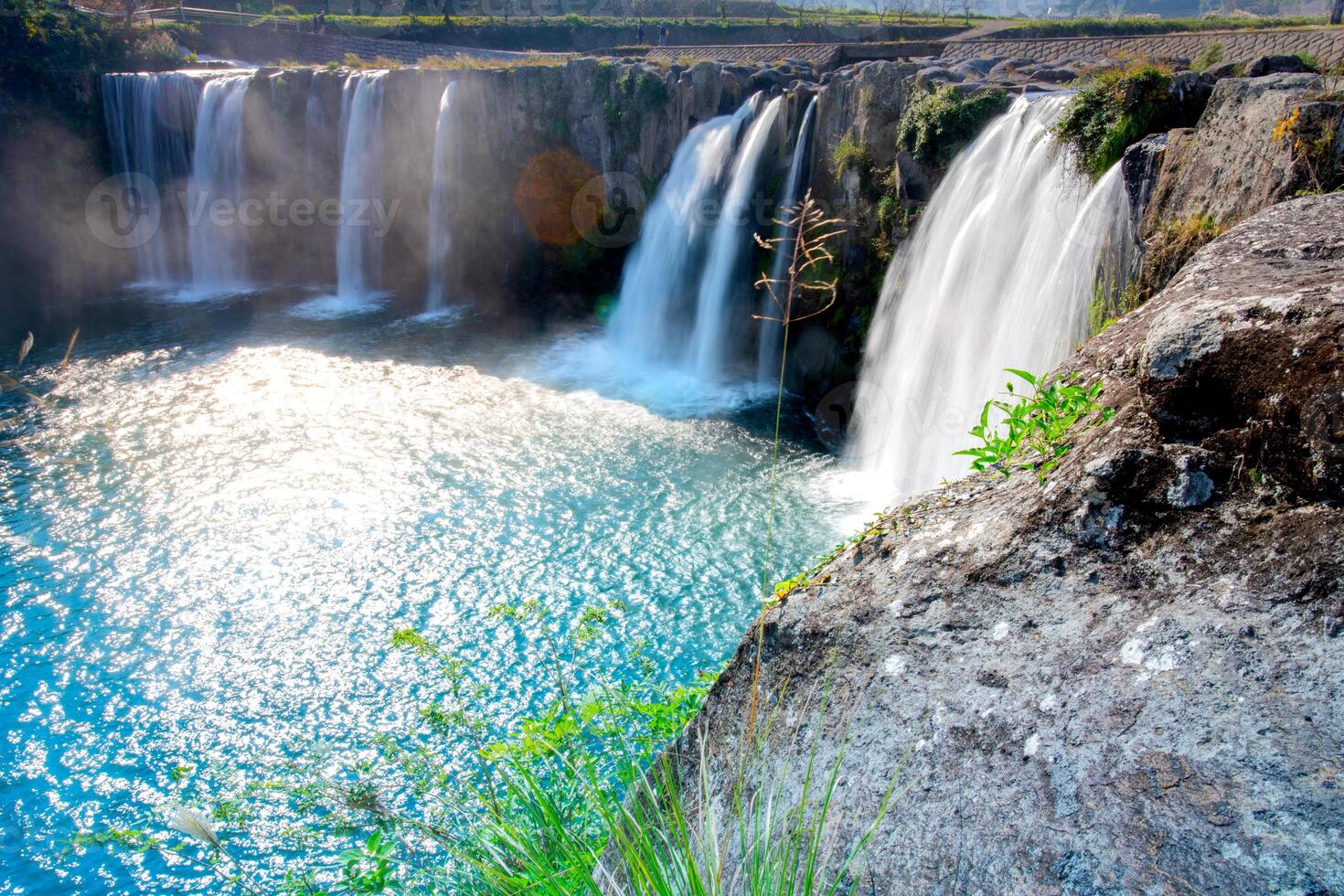 Harajiri Waterfall on Ono River in Ogata Town, referred to as Niagara Falls of East by appearance formed from pyroclastic flows of Mount Aso eruption, Bungo-Ono, Oita, Kyushu photo