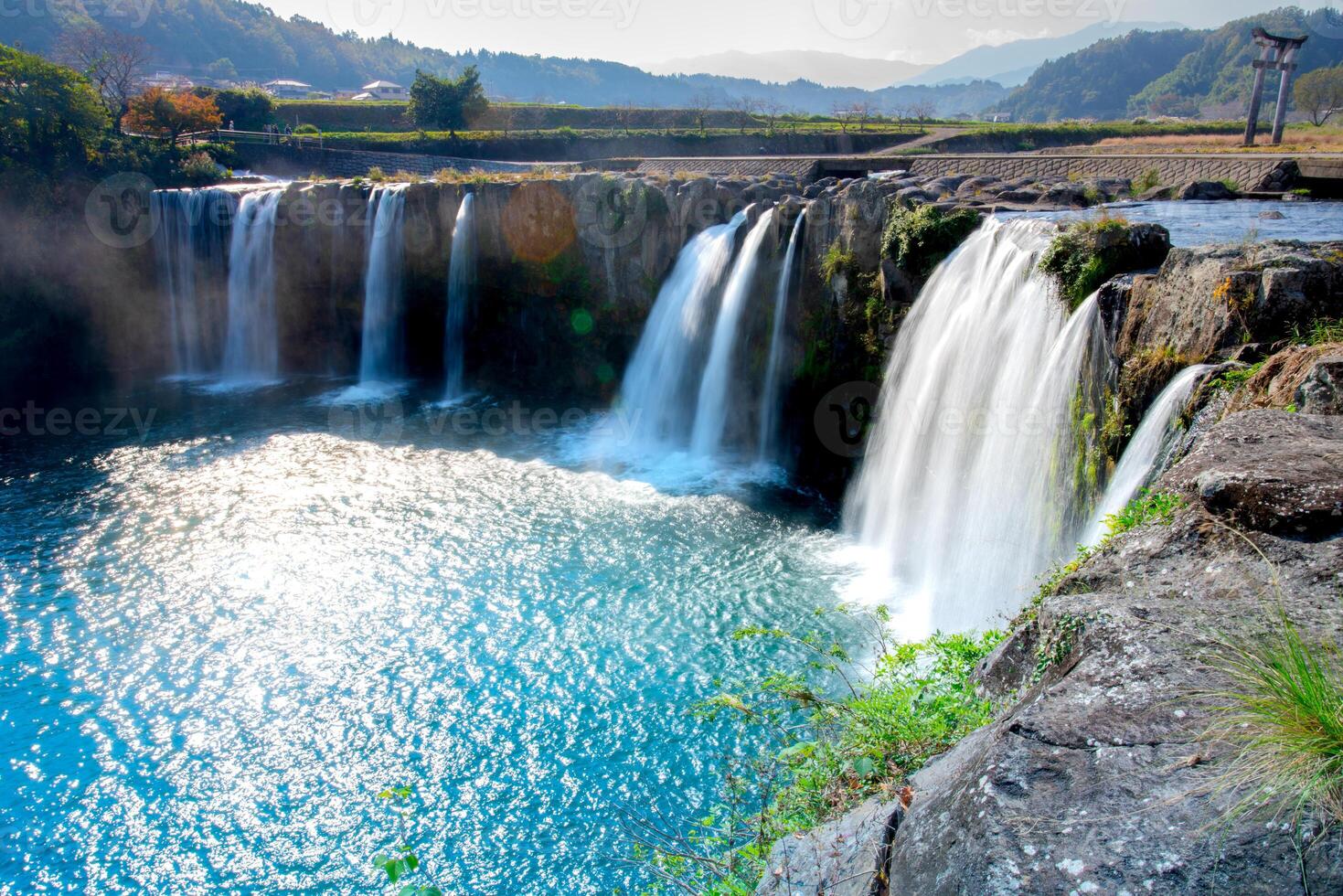 Harajiri falls on Ono River in Ogata Town, referred to as Niagara Falls of East by appearance formed from pyroclastic flows of Mount Aso eruption, Bungo-Ono, Oita, Kyushu, Japan photo
