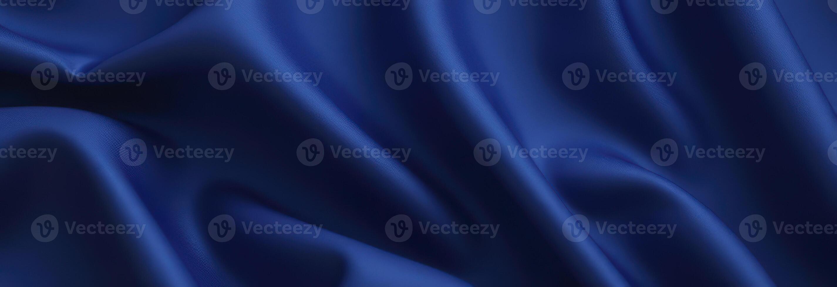 Smooth elegant blue satin fabric forming a beautiful background for luxurious design photo