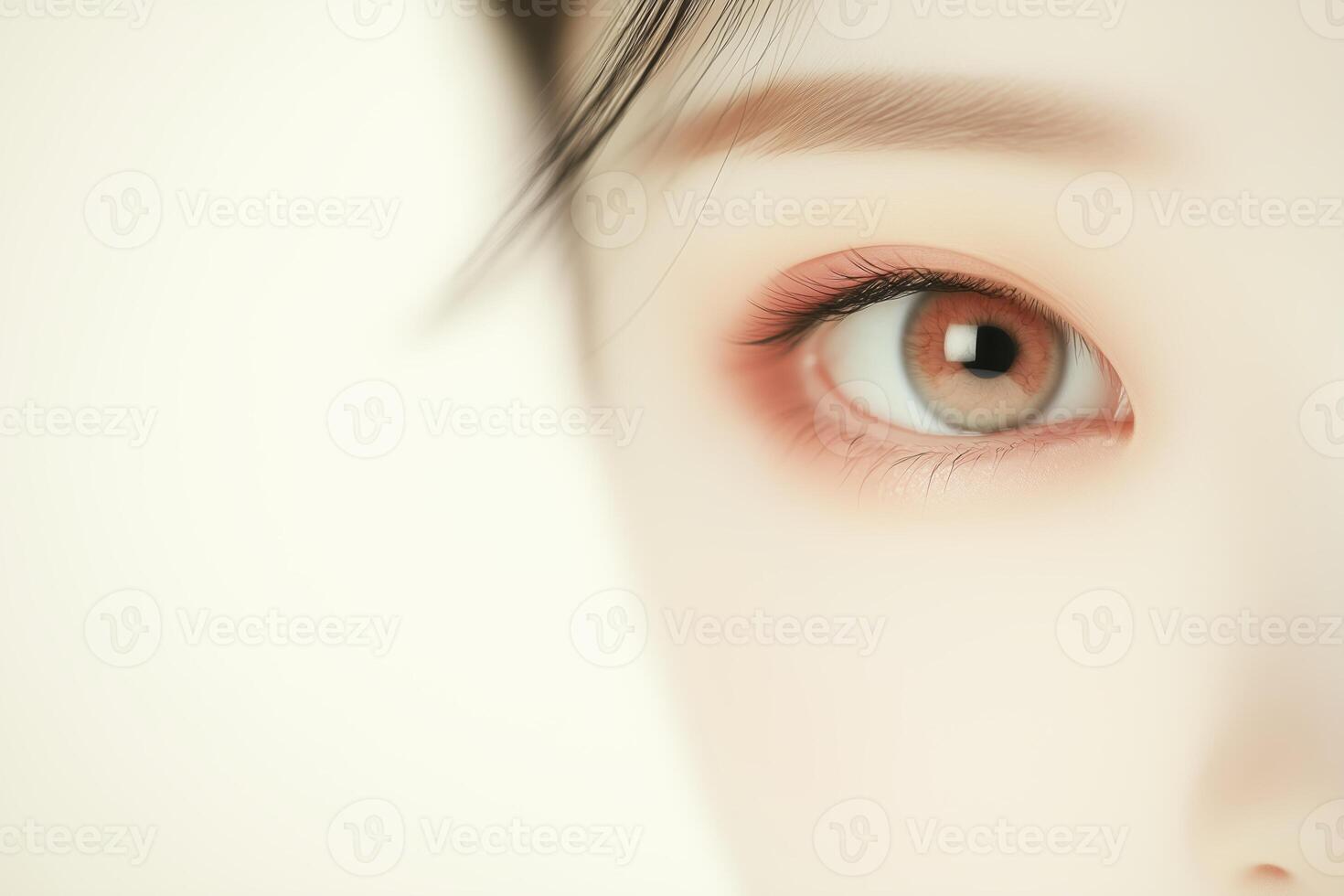 Close-up of beautiful eye showing iris, pupil, and lashes with soft lighting photo