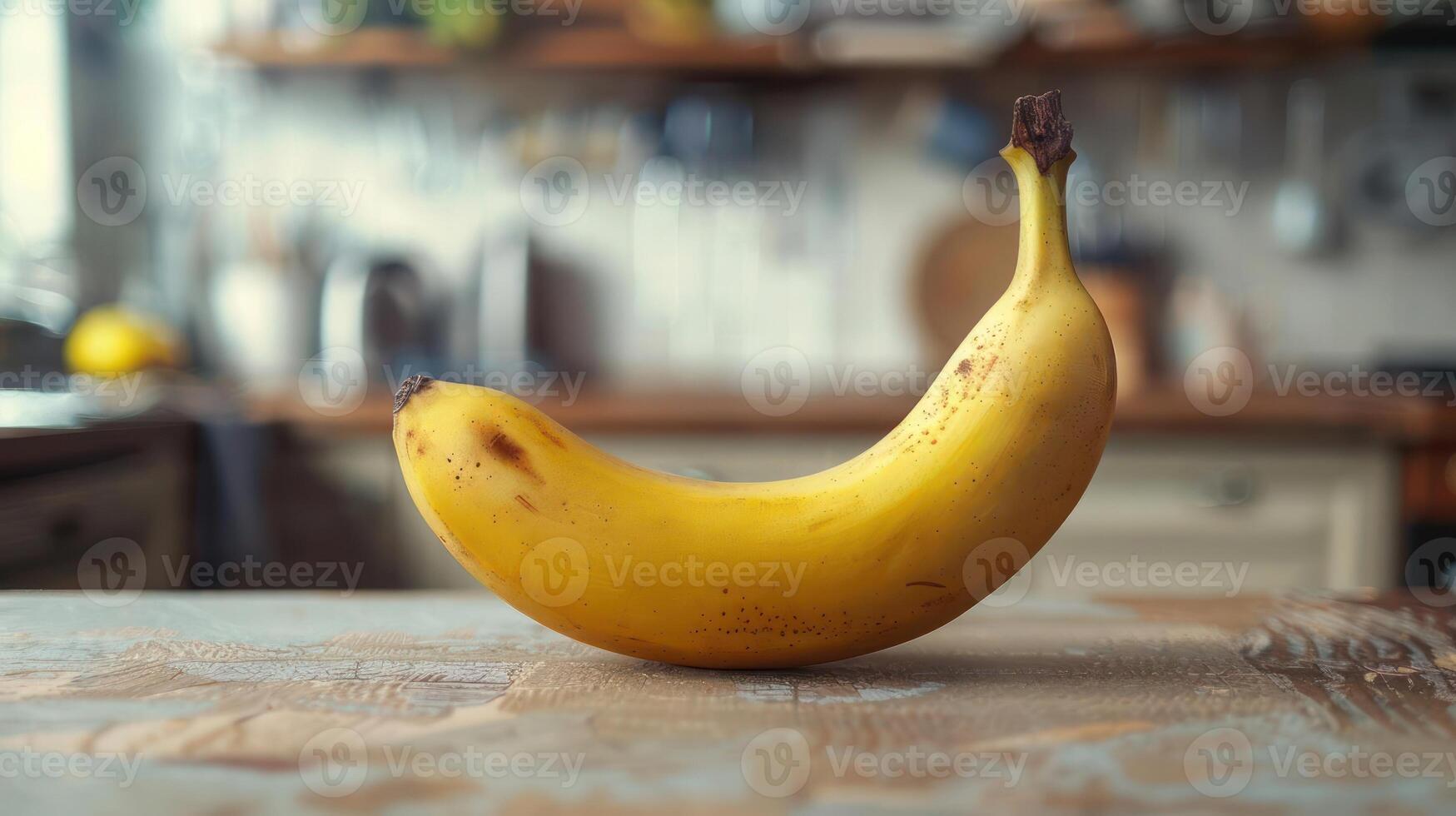 Yellow banana on a wooden table photo