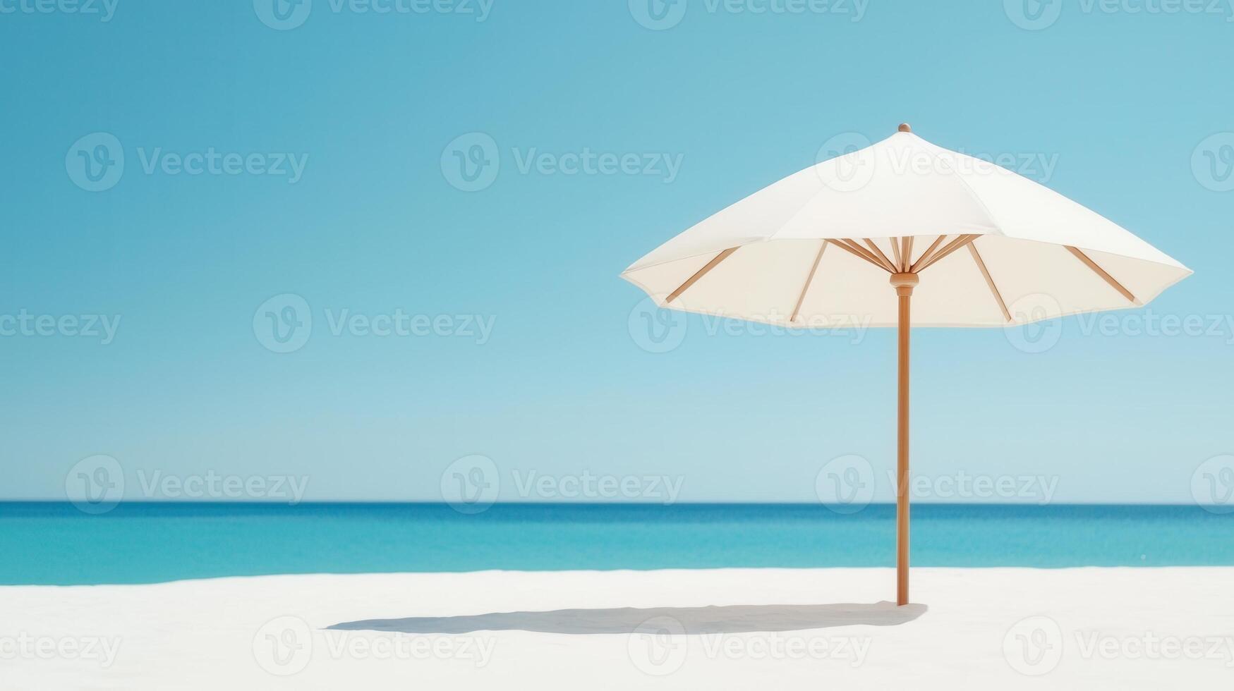 Pristine white sand beach summer featuring sunshade umbrella against turquoise water background, bright blue sky creating serene tropical vacation atmosphere Copy space for text photo