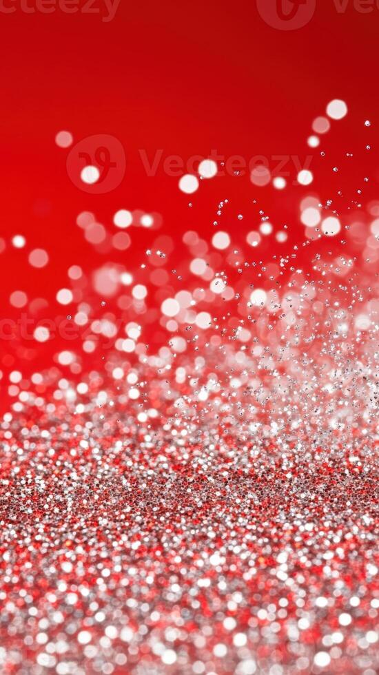 cascading glitter Silver over red glitter, forming festive, shimmering holiday background. Vertical format photo