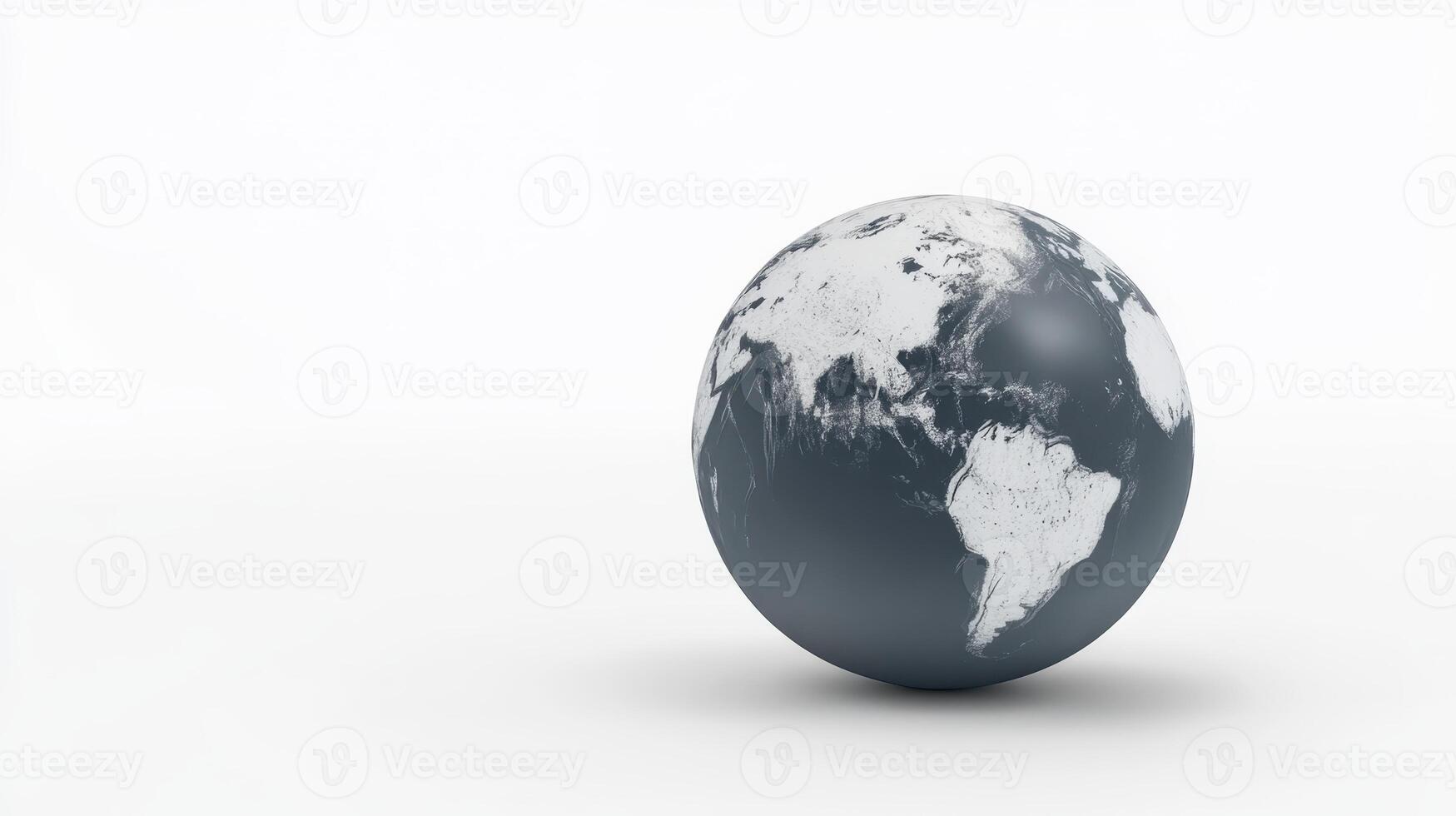 A two-dimensional depiction of a globe on a flat surface, highlighting the continents in various shades of monochrome during midday hours photo