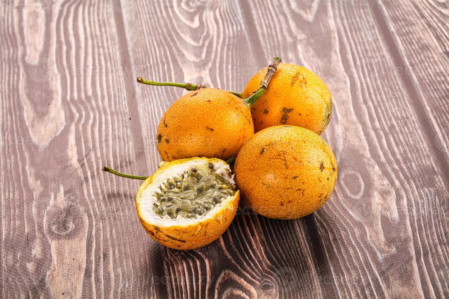 Passion fruit on wooden table photo
